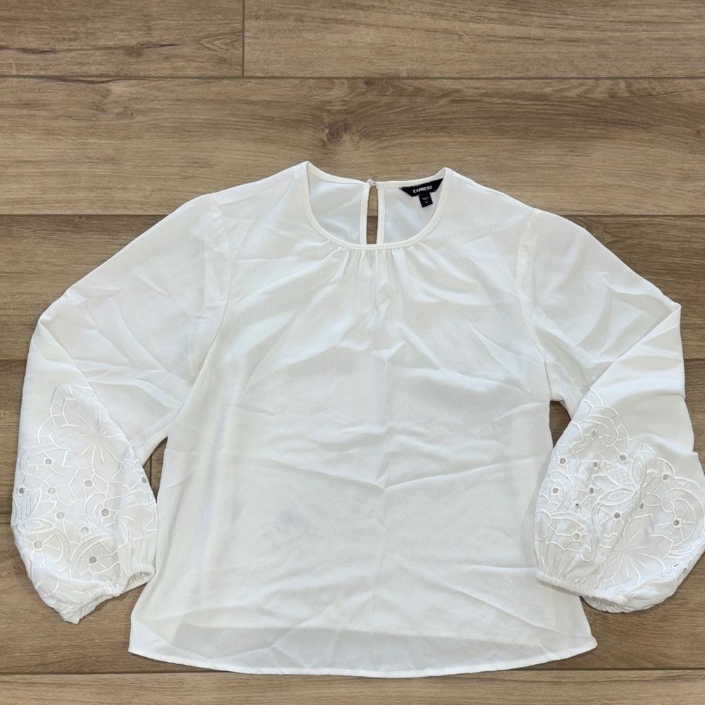 Express woman’s Elegant White Women's Top with cutout details size medium